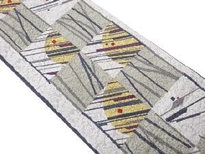 ふくれ織市松に抽象幾何学模様全通洒落袋帯